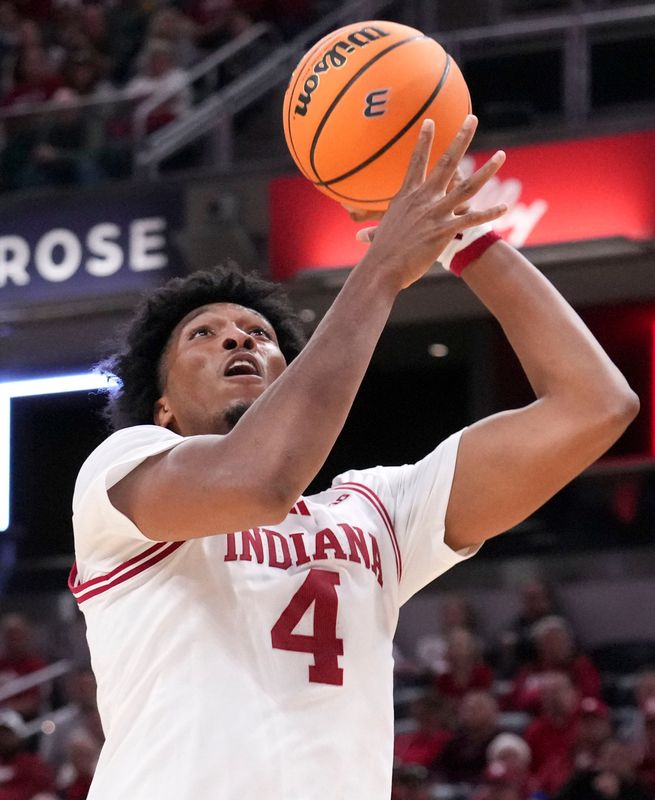 Indiana Hoosiers forward Sam Alexis (4) shoots the ball against the Baylor Bears during an exhibition game Sunday, Oct. 26, 2025, at Gainbridge Fieldhouse in Indianapolis. Indiana defeated Baylor 76-74.