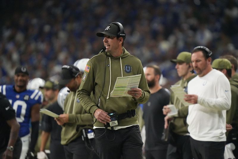 Indianapolis Colts head coach Shane Steichen calls in a play during the game at Lucas Oil Stadium in Indianapolis.