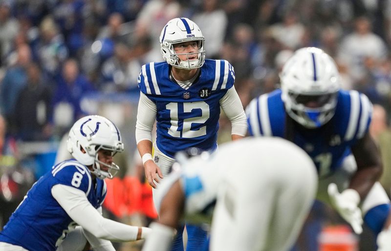 Indianapolis Colts place kicker Michael Badgley (12) prepares to kick the ball Sunday, Oct. 26, 2025, during the game at Lucas Oil Stadium in Indianapolis. The Indianapolis Colts defeated the Tennessee Titans, 38-14.