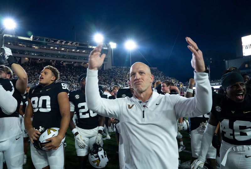 Vanderbilt's coach Clark Lea celebrates with the fans and team after beating Missouri 17-10 at FirstBank Stadium in Nashville, Tenn., Saturday, Oct. 25, 2025.