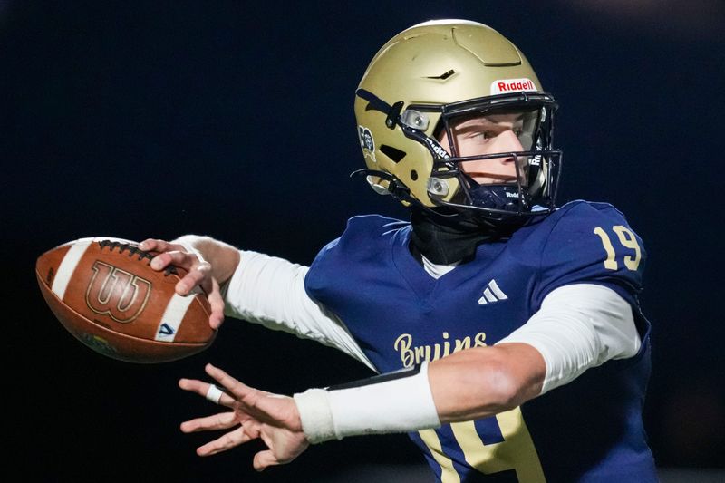 Tri-West Bruins quarterback Jack Sorgi (19) looks to pass Friday, Oct. 31, 2025, during a game between the Tri-West Bruins and the Cascade Cadets at Tri-West High School in Lizton, Ind.