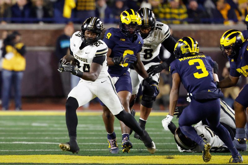 Nov 1, 2025; Ann Arbor, Michigan, USA; Purdue Boilermakers running back Malachi Thomas (24) rushes in the first half against the Michigan Wolverines at Michigan Stadium. Mandatory Credit: Rick Osentoski-Imagn Images