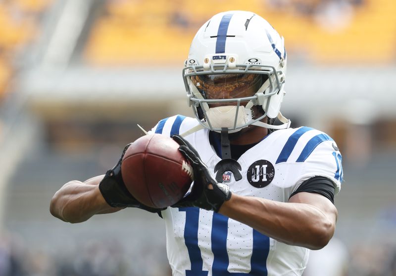 Nov 2, 2025; Pittsburgh, Pennsylvania, USA; Indianapolis Colts wide receiver Adonai Mitchell (10) warms up before the game against the Pittsburgh Steelers at Acrisure Stadium. Mandatory Credit: Charles LeClaire-Imagn Images