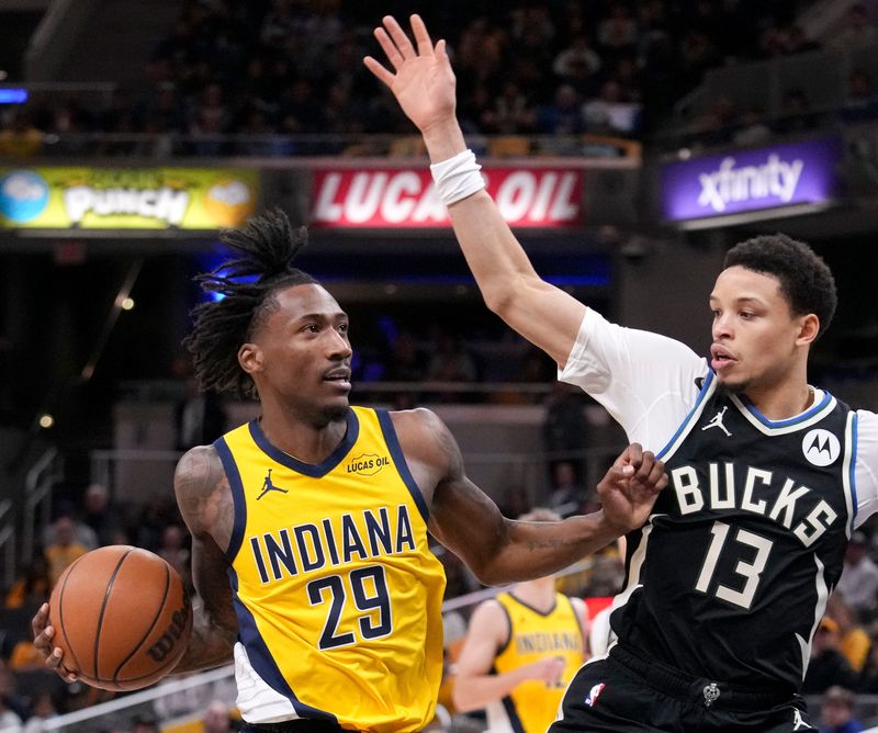 Indiana Pacers guard Quenton Jackson (29) attempts to get past Milwaukee Bucks guard Ryan Rollins (13) during a game Monday, Nov. 3, 2025, at Gainbridge Fieldhouse in Indianapolis. The Bucks defeated the Pacers 117-115.