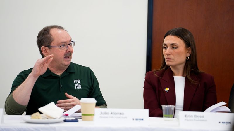 Hoosier Hills Food Bank Executive Director Julio Alonso speaks as Pacers Foundation Executive Director Erin Bess listens during the foundation’s Bloomington roundtable discussion focused on addressing food insecurity Tuesday, Nov. 4, 2025, at Ivy Tech Community College's Bloomington campus.