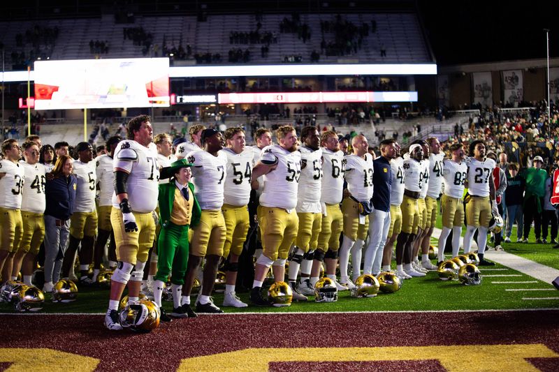 Nov 1, 2025; Chestnut Hill, Massachusetts, USA; Notre Dame Fighting Irish head coach Marcus Freeman and his team after the game against the Boston College Eagles at Alumni Stadium. Mandatory Credit: Edward Finan-Imagn Images