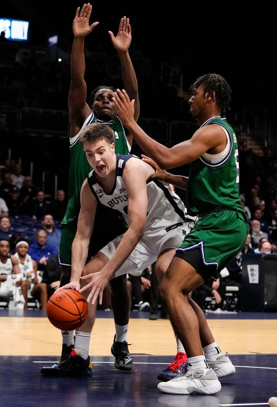Butler Bulldogs forward Jack McCaffery (6) attempts to recover the ball Tuesday, Nov. 11, 2025, during the game at Hinkle Fieldhouse in Indianapolis. The Butler Bulldogs defeated the Chicago State Cougars, 98-66.