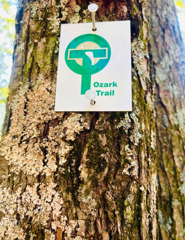 A sign marks the path of the Ozark Trail through the Taum Sauk section in Missouri.