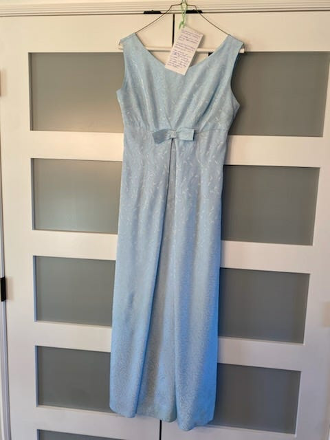 This empire-waist prom dress, made in 1964, recently sold for $20 at the Monroe County History Center Garage Sale.