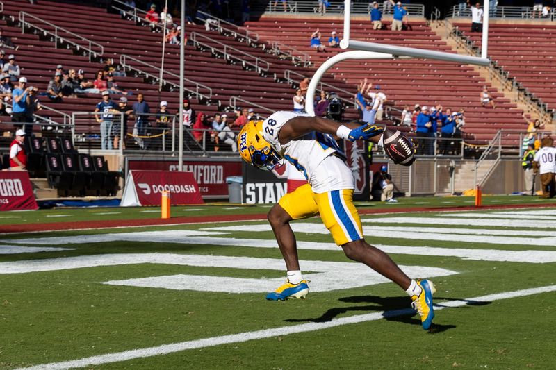 Nov 1, 2025; Stanford, California, USA; Pittsburgh Panthers defensive back Shawn Lee Jr. (28) scores a touchdown on an intercepted pass by Stanford Cardinal quarterback Ben Gulbranson (15) during the third quarter at Stanford Stadium. Mandatory Credit: John Hefti-Imagn Images