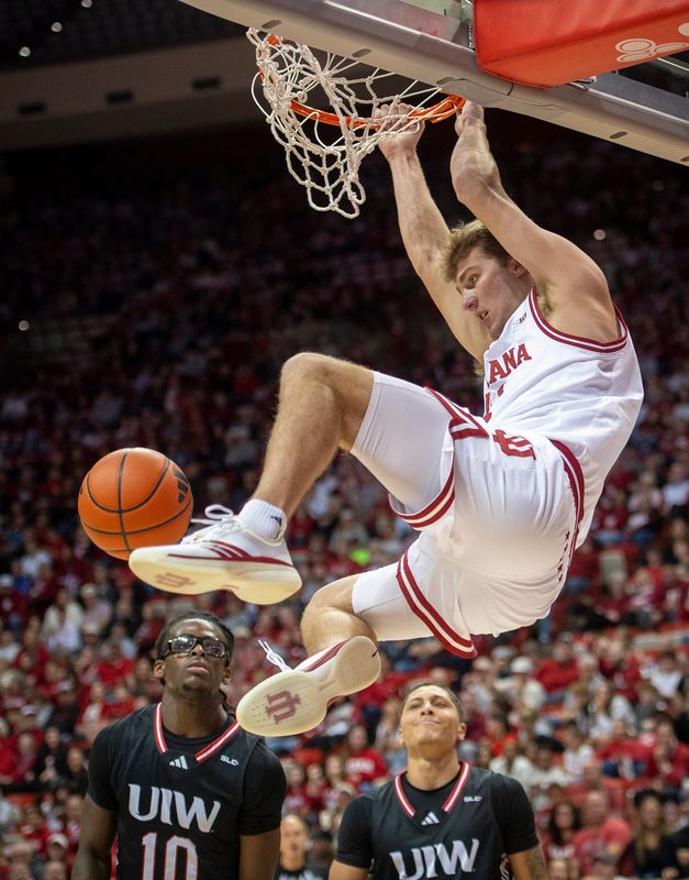 Indiana's Trent Sisley (11) dunks during the Indiana versus Incarnate Word men's basketball game at Simon Skjodt Assembly Hall on Sunday, Nov. 16, 2025.