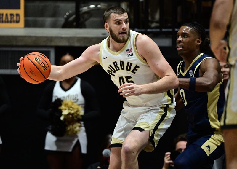 Nov 16, 2025; West Lafayette, Indiana, USA; Purdue Boilermakers center Oscar Cluff (45) leans in against Akron Zips forward Amani Lyles (0) during the first half at Mackey Arena. Mandatory Credit: Marc Lebryk-Imagn Images