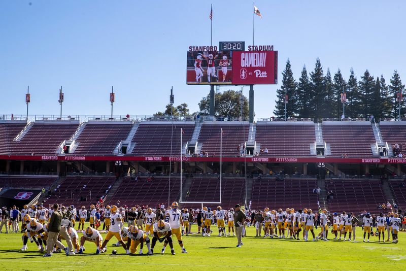 Nov 1, 2025; Stanford, California, USA; Stanford Cardinal and Pittsburgh Panthers players warm up before the game at Stanford Stadium. Mandatory Credit: John Hefti-Imagn Images