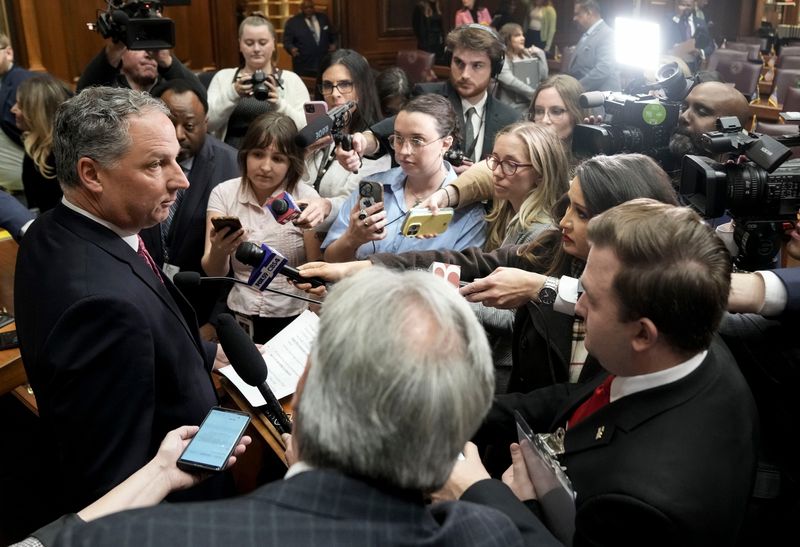 Indiana House Speaker Todd Huston speaks with media members Tuesday, Nov. 18, 2025, during Org Day, the ceremonial first day of the 2026 legislative session, at the Indiana Statehouse in Indianapolis.