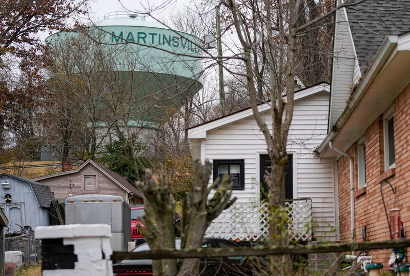 A water tower is seen through the trees in neighborhoods on Thursday, Nov. 20, 2025, in Martinsville.