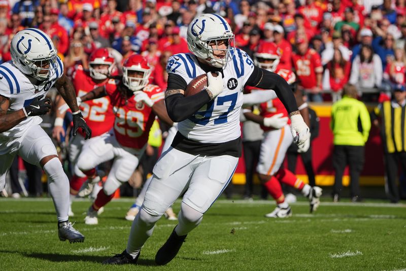 Nov 23, 2025; Kansas City, Missouri, USA; Indianapolis Colts defensive end Laiatu Latu (97) runs after an interception against the Kansas City Chiefs in the first quarter at GEHA Field at Arrowhead Stadium. Mandatory Credit: Denny Medley-Imagn Images