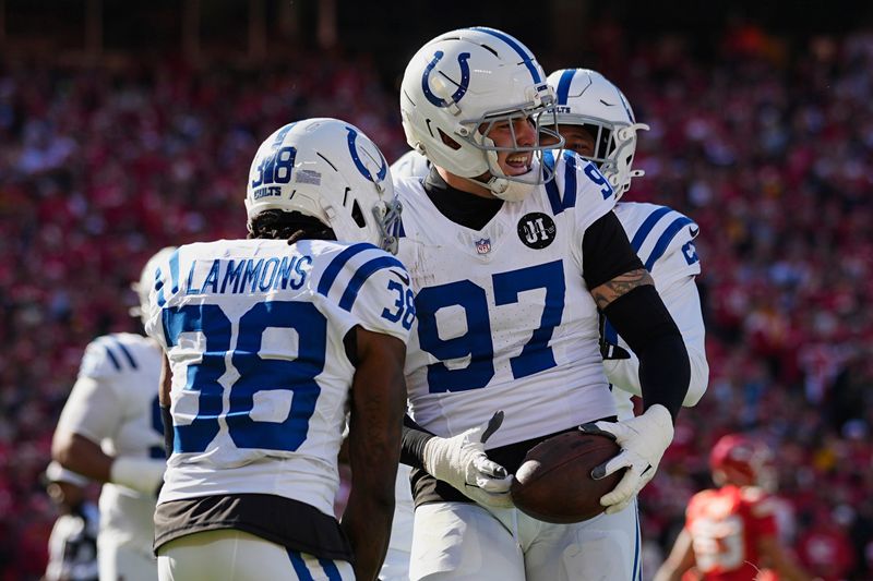 Nov 23, 2025; Kansas City, Missouri, USA; Indianapolis Colts defensive end Laiatu Latu (97) celebrates after an interception against the Kansas City Chiefs in the first quarter at GEHA Field at Arrowhead Stadium. Mandatory Credit: Jay Biggerstaff-Imagn Images