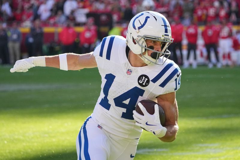 Nov 23, 2025; Kansas City, Missouri, USA; Indianapolis Colts wide receiver Alec Pierce (14) makes a catch against the Kansas City Chiefs in the second half at GEHA Field at Arrowhead Stadium. Mandatory Credit: Denny Medley-Imagn Images