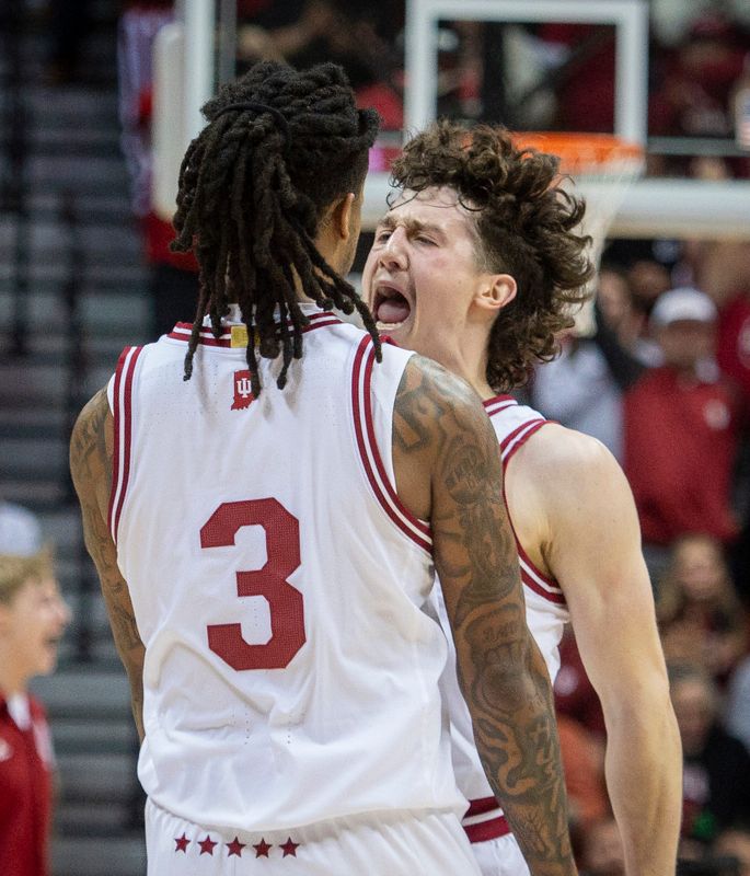 Indiana's Conor Enright (5) and Lamar Wilkerson (3) celebrate during the Indiana versus Kansas State men's basketball game at Simon Skjodt Assembly Hall on Tuesday, Nov. 25, 2025.
