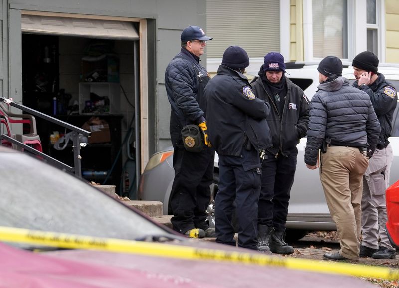 Investigators work the scene where two people were found shot and killed Thursday, Nov. 27, 2025, on the 3700 block of North Audubon Road in Indianapolis.