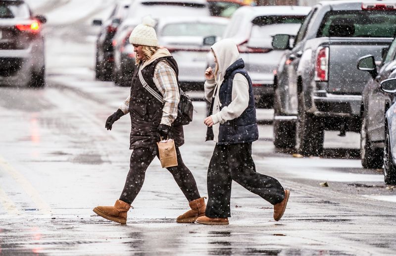 Heavy snow falls in Broad Ripple Village on Saturday, Nov. 29, 2025, in Indianapolis.
