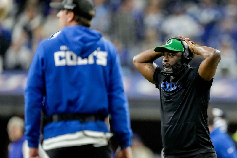 Indianapolis Colts wide receivers coach Reggie Wayne reacts to action on the field Sunday, Nov. 30, 2025, during a game against the Houston Texans at Lucas Oil Stadium in Indianapolis.
