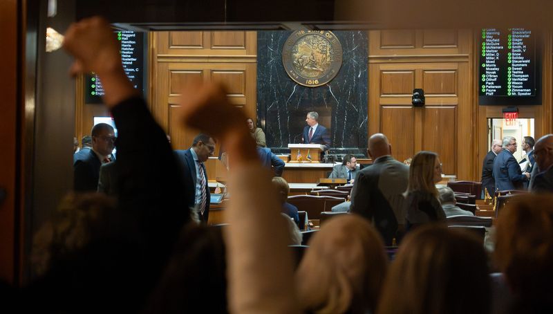 Protesters rally against mid-decade redistricting Monday, Dec. 1, 2025, outside the house chambers at the Indiana Statehouse in Indianapolis.