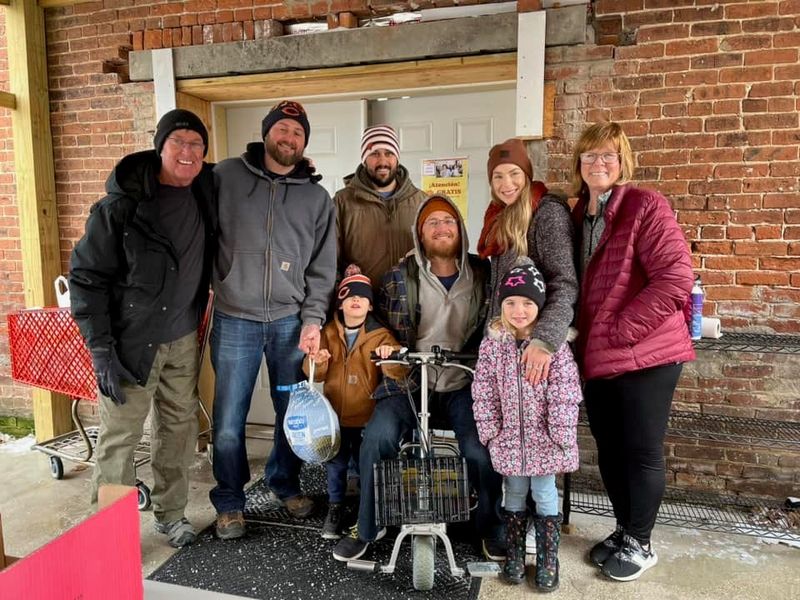 Benton County 2006 graduate and former Indiana All-Star Zach Pettet (center) is seen surrounded by family members.