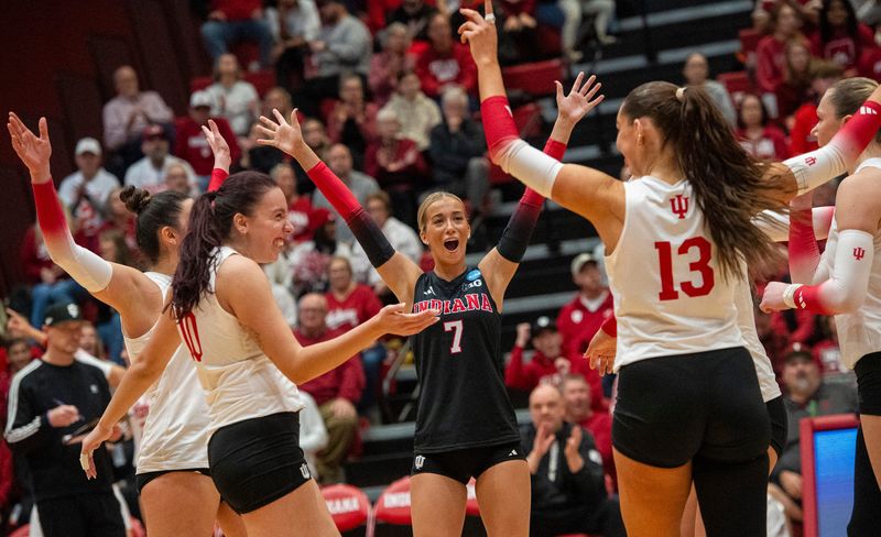 Indiana's Hannah Leftridge (7) and the Hoosiers celebrate as the close in on a victory during the Indiana versus Toledo NCAA First Round volleyball match at Wilkinson Hall on Thursday, Dec. 4, 2025.