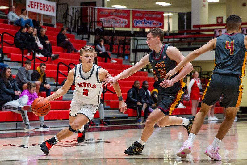 Drew Whitlock (2) of West Lafayette turns the corner on Conner Gamble (30) of McCutcheon during the teams' matchup in the IU Health Hoops Classic on Dec. 6, 2025.