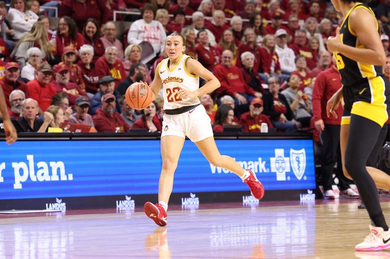 Dec 10, 2025; Ames, Iowa, USA; Iowa State Cyclones Reagan Wilson (22) sets the offense against the Iowa Hawkeyes during the first half at James H. Hilton Coliseum. Mandatory Credit: Reese Strickland-Imagn Images