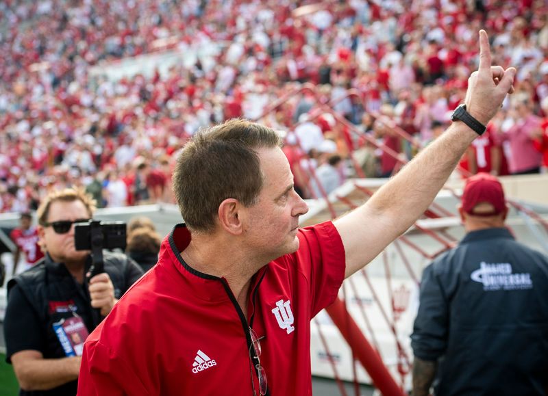 Indiana Head Coach Curt Cignetti holds up the number one to the crowd as he leaves the field after the Indiana versus Wisconson football game at Memorial Stadium on Saturday, Nov. 15, 2025.
