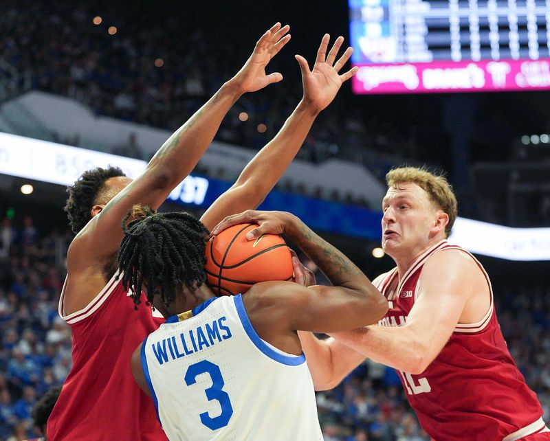 Indiana Hoosiers forward Nick Dorn (7) and Tucker Devries (12) pressure Kentucky Wildcats guard Kam Williams (3) in the first half during college basketball at Rupp Arena in Lexington, Kentucky December 13, 2025.