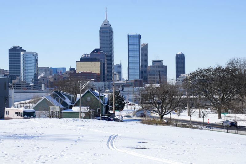 Snow blankets the city Sunday, Dec. 14, 2025, at Highland Park in Indianapolis.
