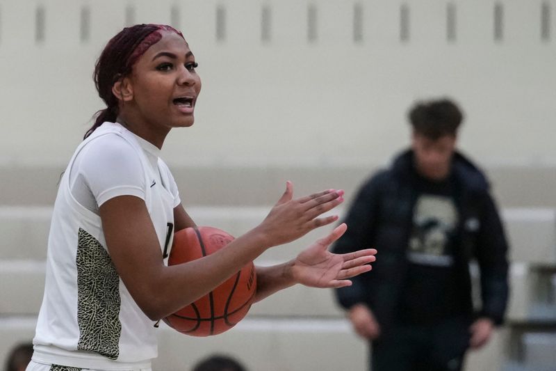 Lapel Bulldogs Laniah Wills (11) celebrates Tuesday, Dec. 16, 2025, after a game between the Lapel Bulldogs and the Eastern Hancock Royals at Lapel High School. The Bulldogs defeated the Royals, 65-62.