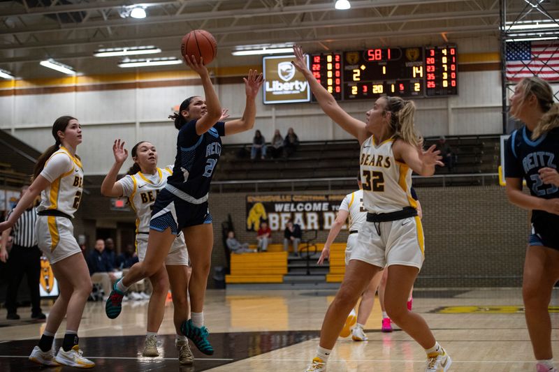 Reitz’s Keilah Mitchell (23) is fouled as the Central Lady Bears host the Reitz Lady Panthers at Central High School Wednesday, Dec. 17, 2025.