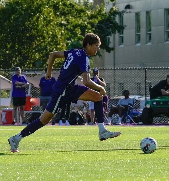 Bloomington South's Andrew Wiley dribbles up field during a game from the 2025 season.