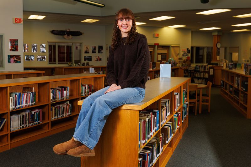 The South Bend Tribune's Student of the Week for the week of Oct. 13, Clara Walton, a senior at Adams High School, poses for a portrait in the school's library on Friday, Dec. 19, 2025, in South Bend.