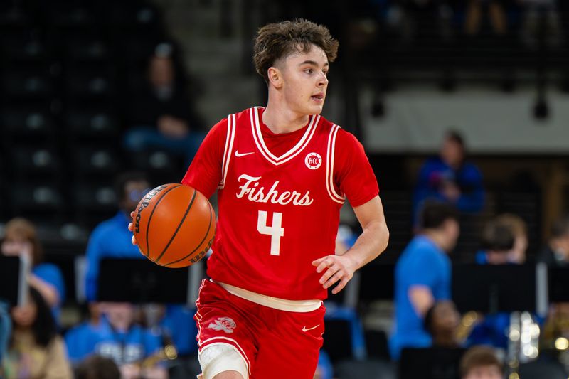 Fishers High School junior Cooper Zachary (4) during the second half of a Mudsock Rivalry basketball game against Hamilton Southeastern High School, Friday, Dec. 19, 2025, at Fishers Event Center. Fishers High School won 68-61.