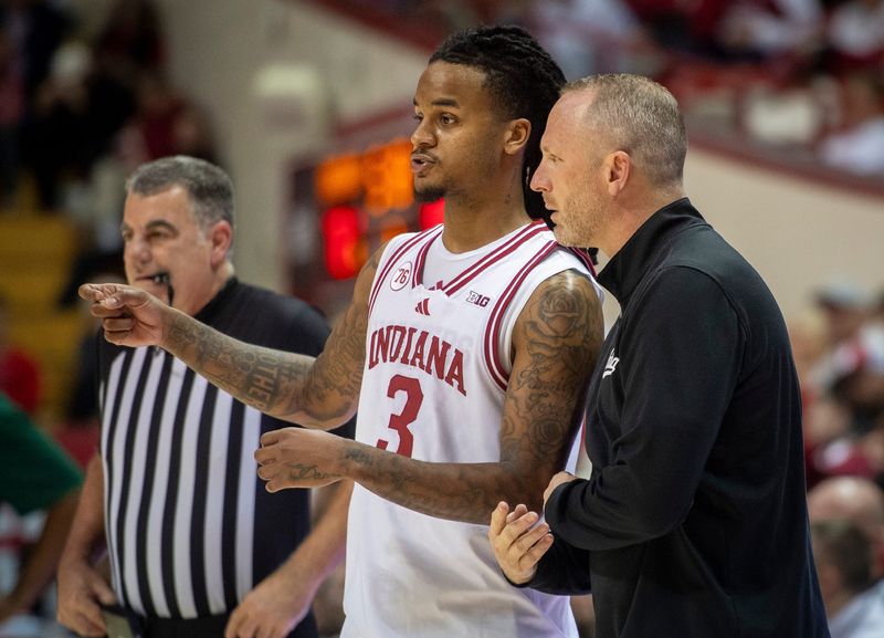Indiana's Lamar Wilkerson (3) talks with Head Coach Darian DeVries during the Indiana versus Chicago State men's basketball game at Simon Skjodt Assembly Hall on Saturday, Dec. 20, 2025.