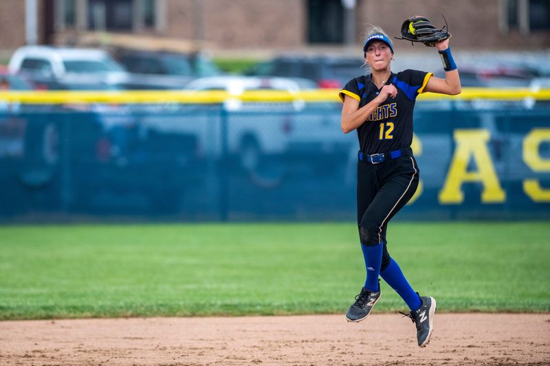 Castle's Emma Bruggenschmidt (12) outs a runner as the Castle Knights play the Boonville Pioneers in Newburgh, Ind., May 13, 2025.