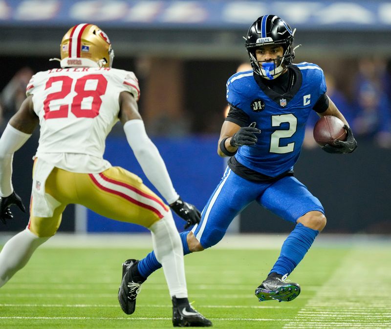 Dec 22, 2025; Indianapolis, Indiana, USA; Indianapolis Colts wide receiver Josh Downs (2) looks to move past San Francisco 49ers cornerback Darrell Luter Jr. (28) during the first quarter at Lucas Oil Stadium. Mandatory Credit: Grace Hollars-USA TODAY Network via Imagn Images