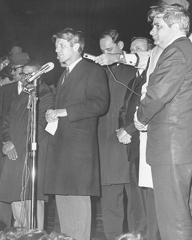 Kennedy, shown in April 1968, speaks to an Indianapolis crowd, telling them of the assassination of King. Kennedy is credited for helping keep the city calm amid riots in other cities.
 Leroy Patton/Indianapolis News
Robert F. Kennedy, shown in this April 1968 file photo, as he speaks to an Indianapolis crowd telling them of the assassination of Martin Luther King Jr. As riots erupted in dozens of cities after the assassination of King 40 years ago this Friday, Kennedy gave a famous speech in Indianapolis that night that is credited for helping keep the city calm.