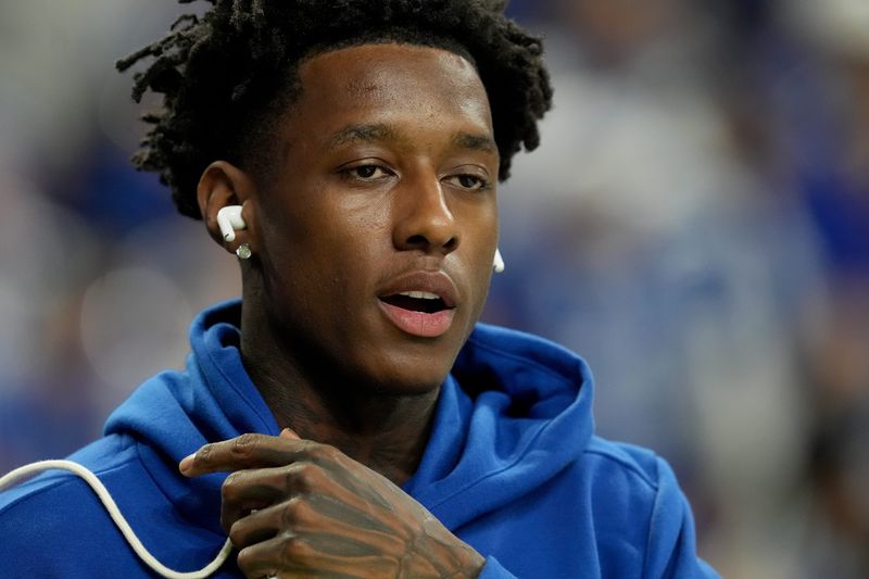 Indianapolis Colts cornerback Sauce Gardner (1) makes his way onto the field Sunday, Dec. 28, 2025, ahead of a game against the Jacksonville Jaguars at Lucas Oil Stadium in Indianapolis.