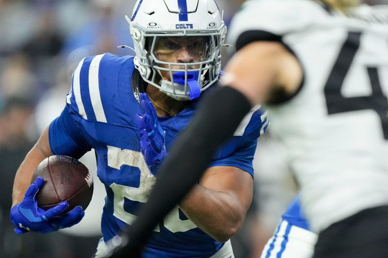 Indianapolis Colts running back Jonathan Taylor (28) rushes the ball Sunday, Dec. 28, 2025, during a game against the Jacksonville Jaguars at Lucas Oil Stadium in Indianapolis.