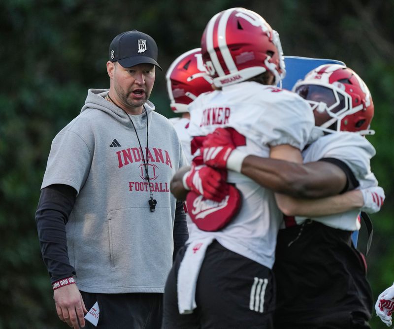 Indiana Hoosiers defensive coordinator Bryant Haines talks to players during drills Tuesday, Dec. 30, 2025, during practice ahead of the Rose Bowl game against Alabama Crimson Tide at Dignity Health Sports Park in Los Angeles.