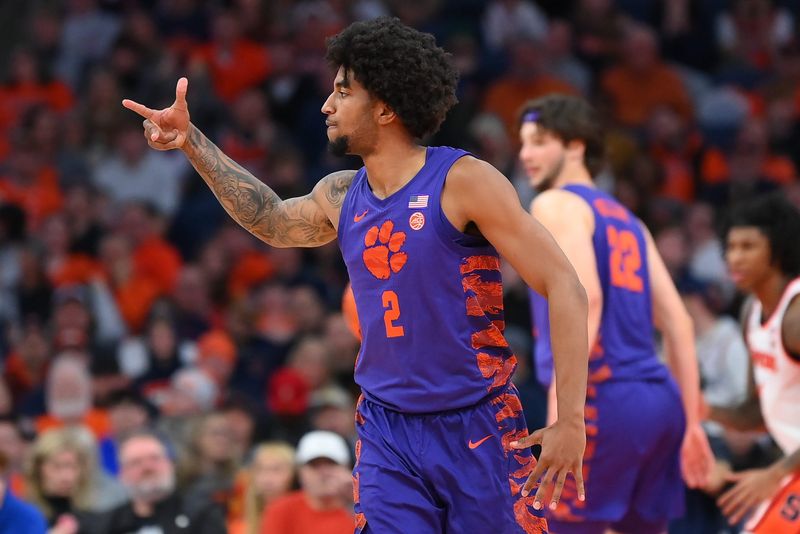 Dec 31, 2025; Syracuse, New York, USA; Clemson Tigers guard Dillon Hunter (2) reacts to his made three-point basket during the second half against the Syracuse Orange at the JMA Wireless Dome. Mandatory Credit: Rich Barnes-Imagn Images
