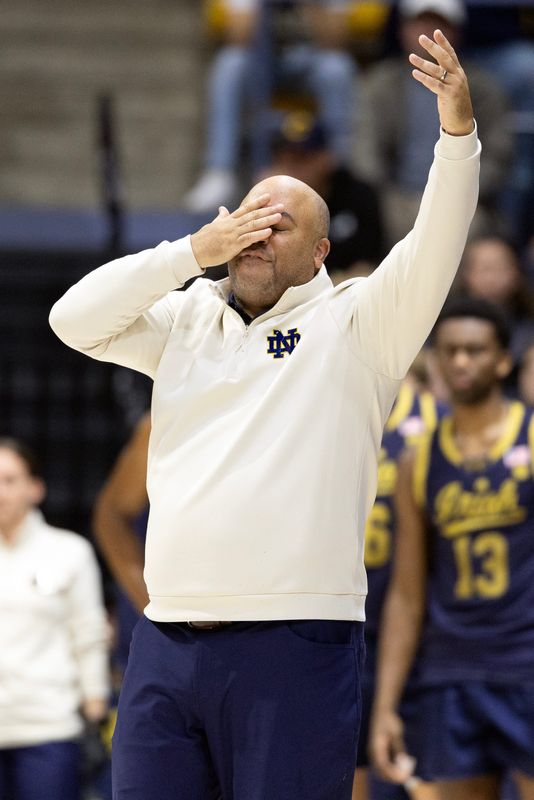 Jan 2, 2026; Berkeley, California, USA; Notre Dame Fighting Irish head coach Micah Shrewsberry argues a foul call against his team during the second half with the California Golden Bears at Haas Pavilion. Mandatory Credit: D. Ross Cameron-Imagn Images