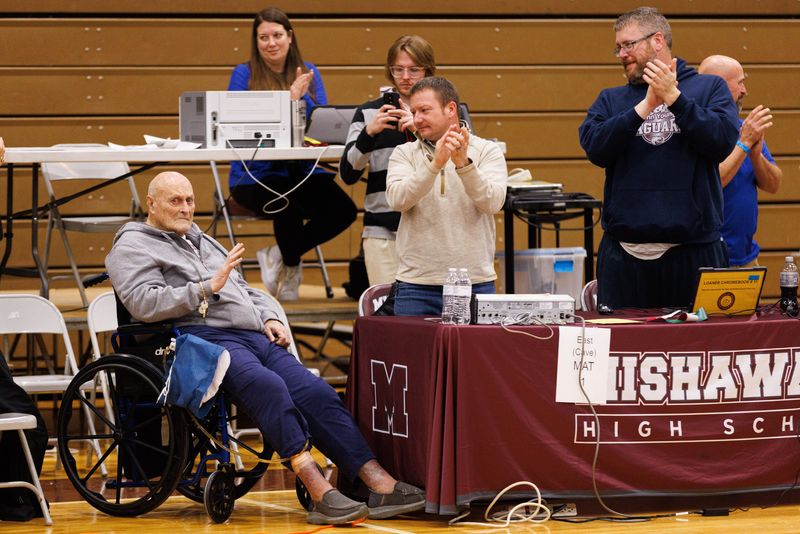 Al Smith, left, is acknowledged at the Al Smith Classic Wrestling Invitational at Mishawaka High School on Saturday, Jan. 3, 2026, in Mishawaka.