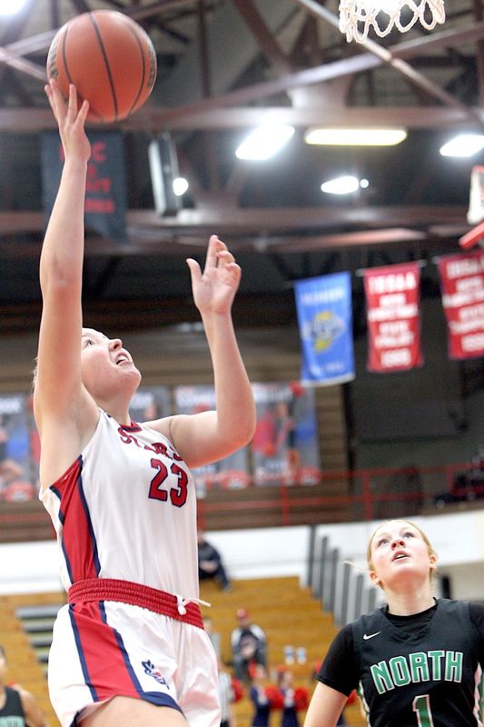 Bedford North Lawrence's Sammie Nusbaum (23) takes it to the basket during the BNL/Evansville North game Saturday, Jan. 3, 2026.